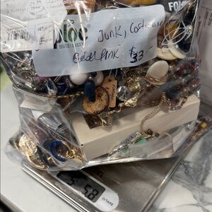 over 8 pound lot of costume jewelry, some pieces and parts. So much fun.